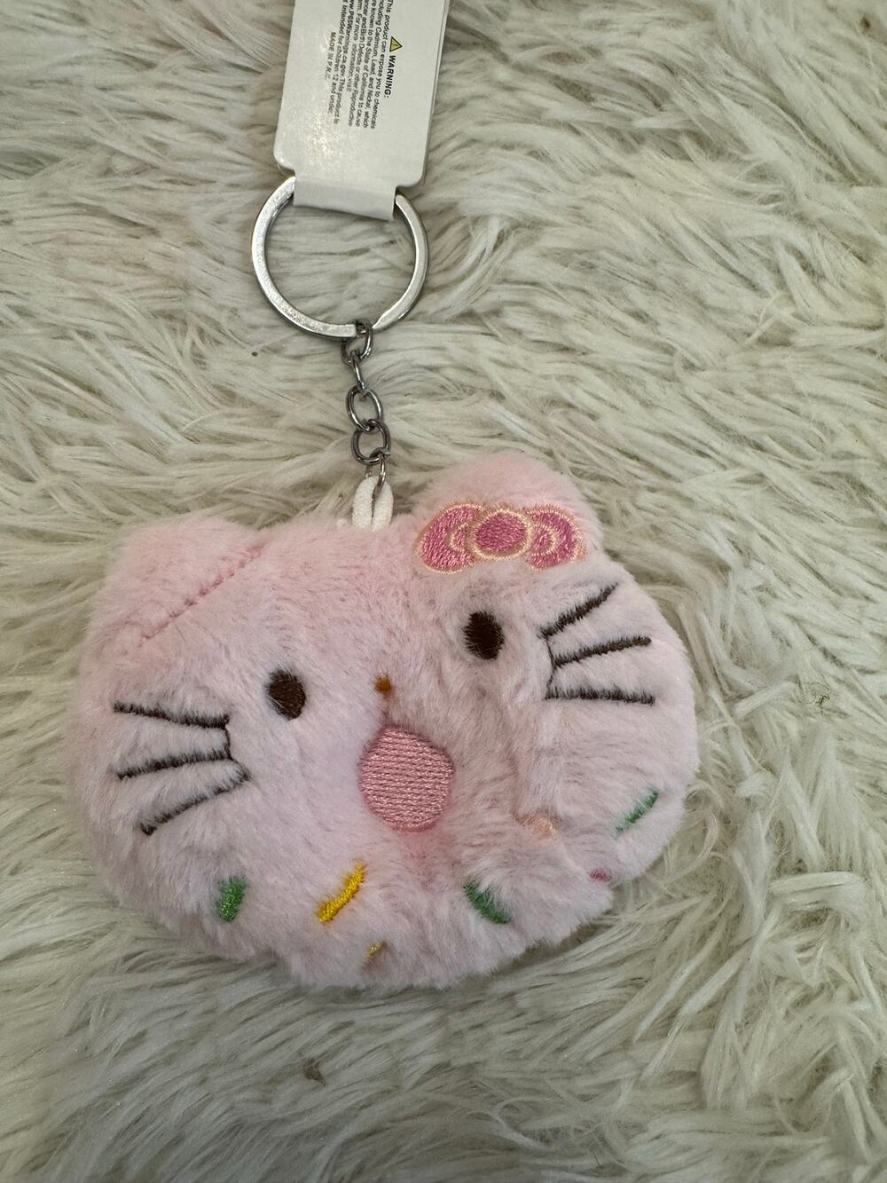Sanrio Hello Kitty pink plush keychain donut  with embroidered face and bow